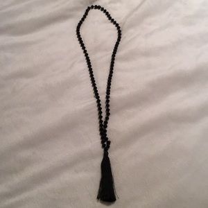 Black beaded and tassel necklace